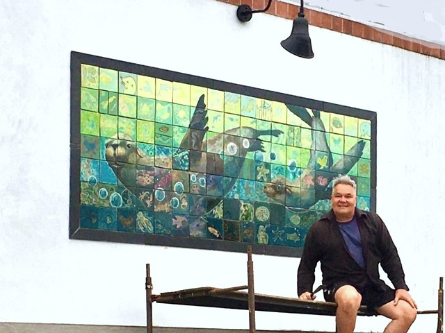 Mike Tauber in front of Mosaic Mural